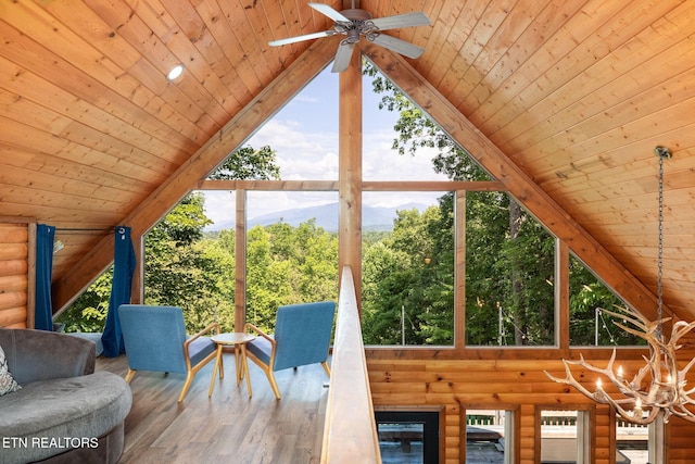 531 Gatlin Dr, Gatlinburg, TN 37738 - sunroom / solarium featuring a mountain view, lofted ceiling, and a chandelier
