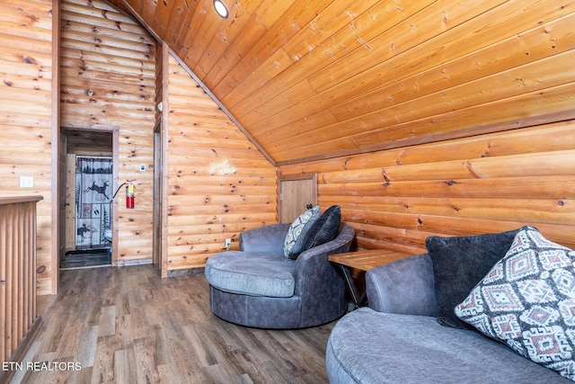 531 Gatlin Dr, Gatlinburg, TN 37738 - sitting room with vaulted ceiling, wood ceiling, wood finished floors, and rustic walls