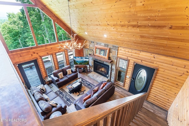531 Gatlin Dr, Gatlinburg, TN 37738 - living room featuring log walls, high vaulted ceiling, wooden ceiling, a chandelier, and plenty of natural light