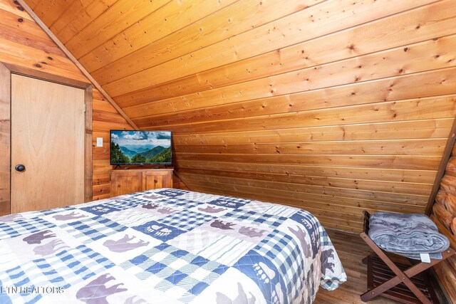 531 Gatlin Dr, Gatlinburg, TN 37738 - bedroom with lofted ceiling, wood ceiling, wood walls, and wood finished floors