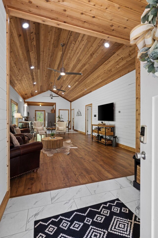 living area featuring marble finish floor, lofted ceiling, ceiling fan, recessed lighting, and wooden ceiling