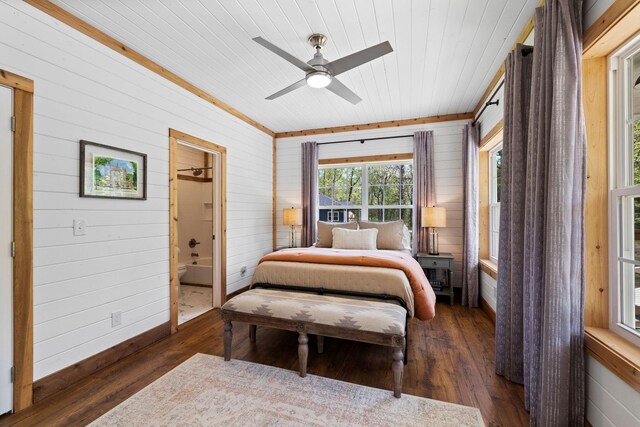 bedroom with wood finished floors, wooden walls, and wooden ceiling