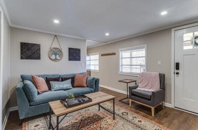 living room with crown molding, recessed lighting, and dark wood-style flooring