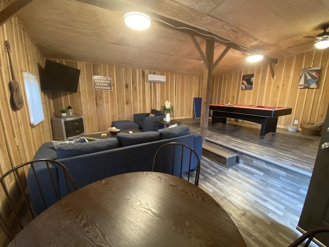 game room featuring wooden walls, billiards, ceiling fan, and wood finished floors