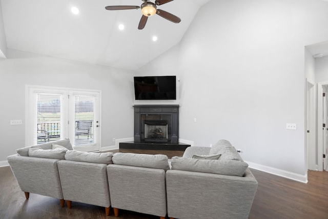 living area with dark wood finished floors, baseboards, a ceiling fan, and recessed lighting