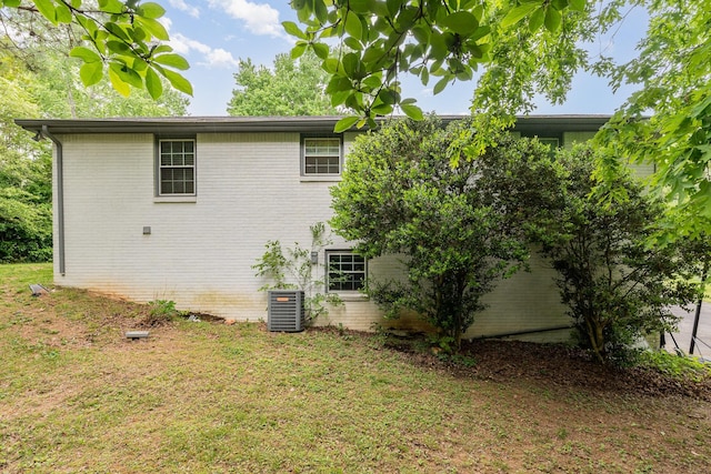 7205 Birchbark Dr, Fairview, TN 37062 - view of side of property featuring brick siding and a yard