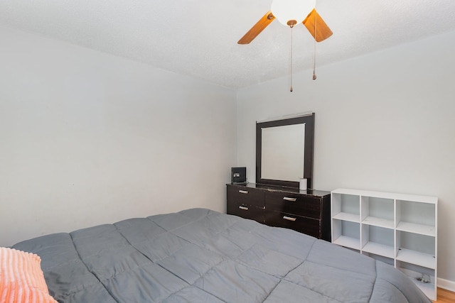 7205 Birchbark Dr, Fairview, TN 37062 - bedroom featuring ceiling fan and a textured ceiling