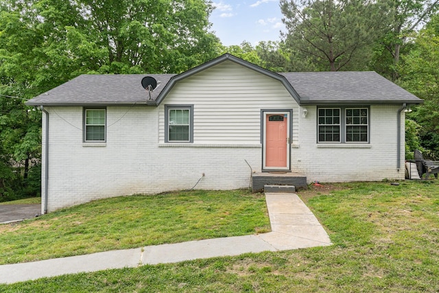7205 Birchbark Dr, Fairview, TN 37062 - view of front of property featuring brick siding, a front yard, and roof with shingles