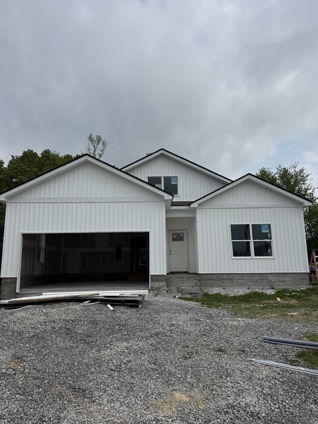 125 Reece Rd, Baxter, TN 38544 - view of front of house with board and batten siding and an attached garage
