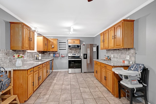 1032 Gordon Cir, Burns, TN 37029 - kitchen featuring appliances with stainless steel finishes, a sink, backsplash, light stone countertops, and crown molding