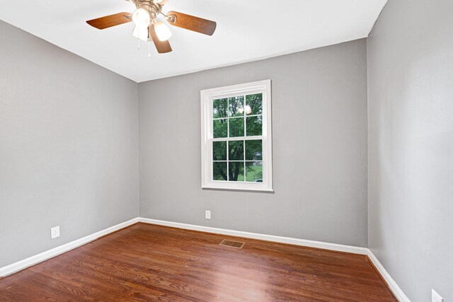 1032 Gordon Cir, Burns, TN 37029 - spare room with baseboards, wood finished floors, and ceiling fan