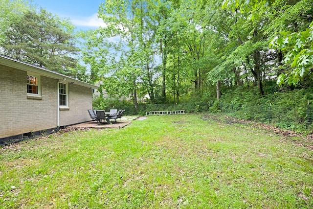 1032 Gordon Cir, Burns, TN 37029 - view of yard featuring a patio area