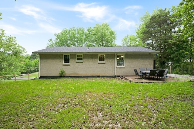 1032 Gordon Cir, Burns, TN 37029 - back of house featuring brick siding and a patio area