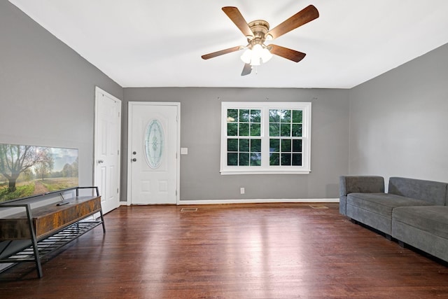 1032 Gordon Cir, Burns, TN 37029 - living area featuring wood finished floors, ceiling fan, and baseboards