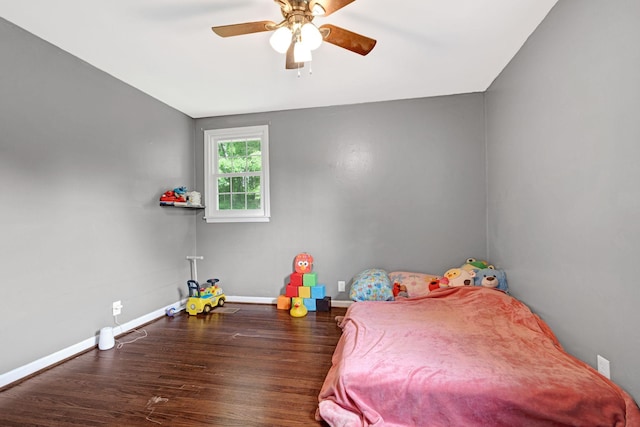 1032 Gordon Cir, Burns, TN 37029 - bedroom featuring wood finished floors, baseboards, and ceiling fan