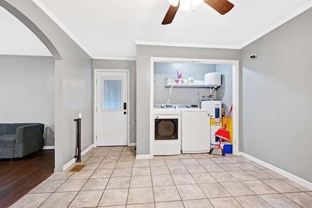1032 Gordon Cir, Burns, TN 37029 - washroom with washing machine and dryer, electric water heater, arched walkways, crown molding, and a ceiling fan