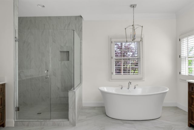 full bath with vanity, marble finish floor, a notable chandelier, and a shower stall