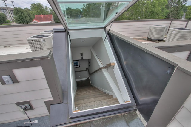 view of storm shelter featuring central AC unit