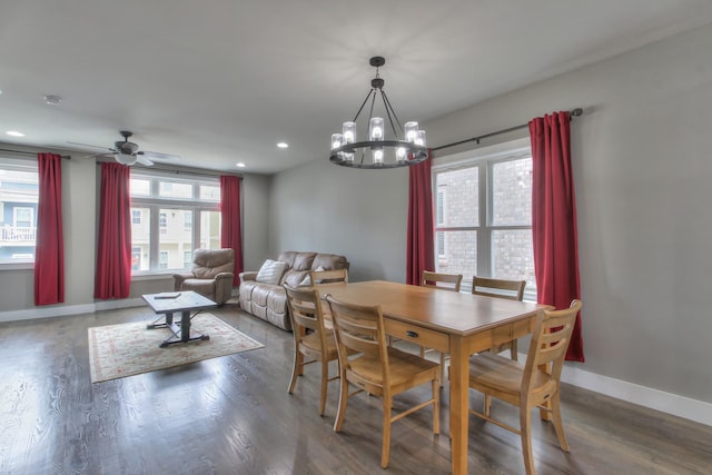 dining space featuring baseboards, wood finished floors, and a wealth of natural light