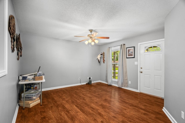 3513 Hunters Rdg, Woodlawn, TN 37191 - entryway featuring wood finished floors, a ceiling fan, a textured ceiling, and baseboards