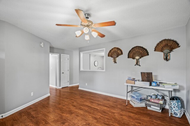 3513 Hunters Rdg, Woodlawn, TN 37191 - unfurnished office featuring a ceiling fan, wood finished floors, and baseboards