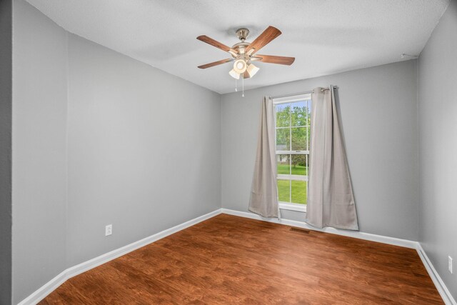 3513 Hunters Rdg, Woodlawn, TN 37191 - empty room featuring baseboards, wood finished floors, and ceiling fan