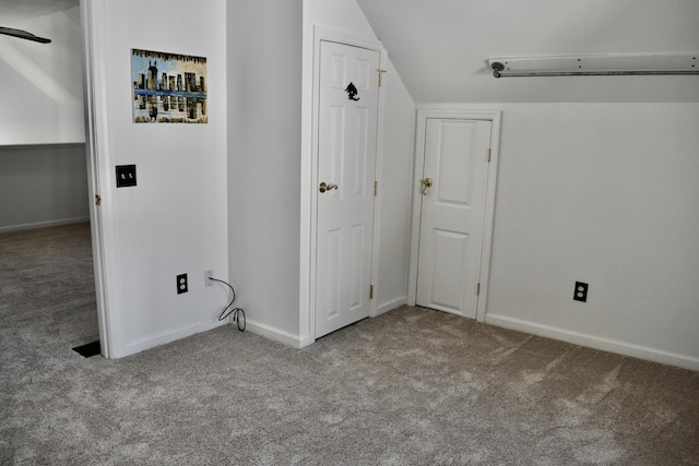 339 Perrolee St, Gallatin, TN 37066 - unfurnished bedroom featuring baseboards, carpet, and lofted ceiling