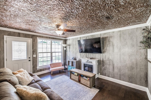 907 N Graycroft Ave, Madison, TN 37115 - living area featuring ceiling fan, baseboards, crown molding, a glass covered fireplace, and wood finished floors