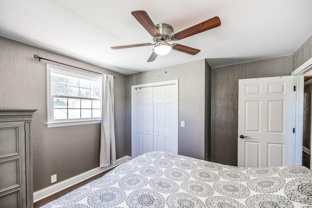 907 N Graycroft Ave, Madison, TN 37115 - bedroom with a closet, wood finished floors, a ceiling fan, and baseboards
