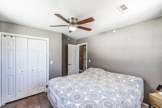 907 N Graycroft Ave, Madison, TN 37115 - bedroom with dark wood-style floors, a closet, and ceiling fan