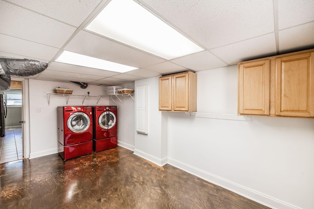 907 N Graycroft Ave, Madison, TN 37115 - laundry room featuring washer and dryer, cabinet space, and baseboards