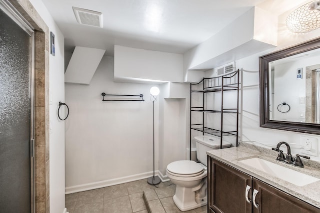 907 N Graycroft Ave, Madison, TN 37115 - bathroom featuring toilet, tile patterned flooring, vanity, a shower with shower door, and baseboards