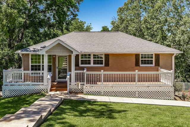 907 N Graycroft Ave, Madison, TN 37115 - ranch-style house with a shingled roof, a front lawn, and brick siding