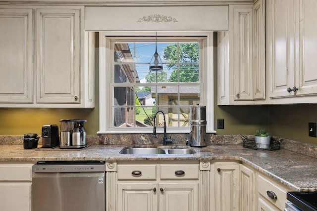 206 Evergreen Dr, Columbia, TN 38401 - kitchen featuring a sink, light stone counters, cream cabinets, and dishwasher
