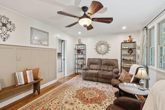 206 Evergreen Dr, Columbia, TN 38401 - living area featuring wainscoting, a ceiling fan, ornamental molding, and wood finished floors