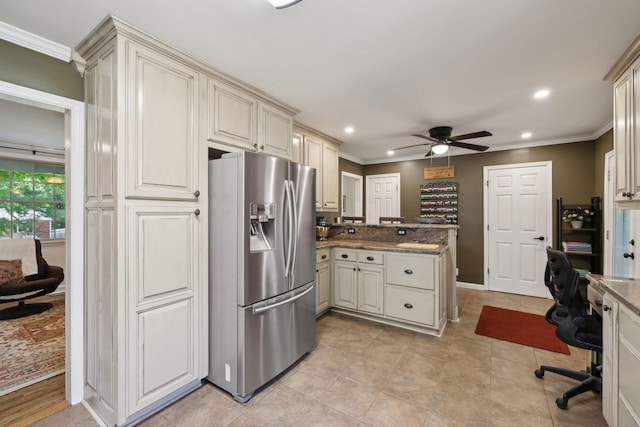 206 Evergreen Dr, Columbia, TN 38401 - kitchen featuring crown molding, a peninsula, a ceiling fan, and stainless steel fridge