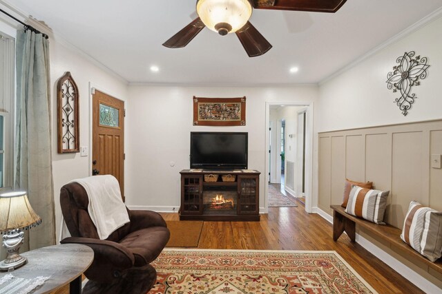 206 Evergreen Dr, Columbia, TN 38401 - living room featuring wainscoting, ornamental molding, a ceiling fan, and wood finished floors
