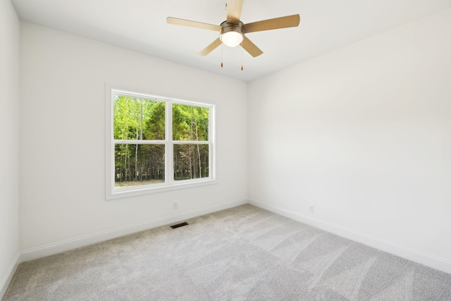 1065 Gholson Rd, Clarksville, TN 37043 - empty room featuring visible vents, carpet flooring, baseboards, and a ceiling fan