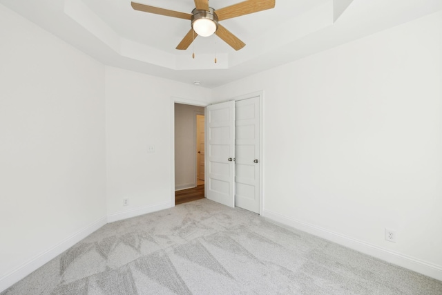 1065 Gholson Rd, Clarksville, TN 37043 - unfurnished bedroom with carpet floors, a raised ceiling, and baseboards