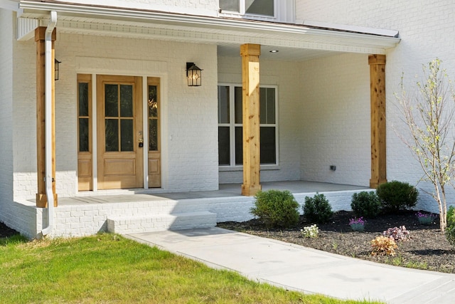 1065 Gholson Rd, Clarksville, TN 37043 - property entrance featuring brick siding and covered porch