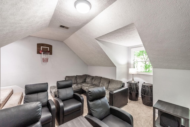 1505 Newmans Trl, Hendersonville, TN 37075 - home theater featuring visible vents, carpet, a textured ceiling, and vaulted ceiling