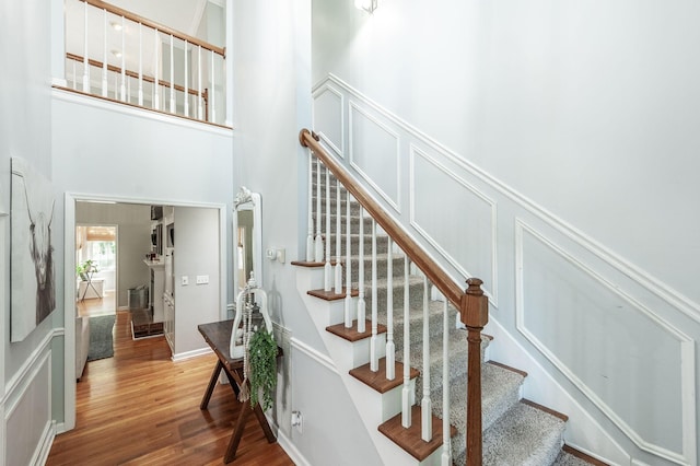 1505 Newmans Trl, Hendersonville, TN 37075 - staircase featuring wood finished floors and a high ceiling
