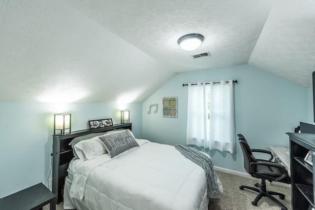 1505 Newmans Trl, Hendersonville, TN 37075 - bedroom with visible vents, a textured ceiling, lofted ceiling, and carpet