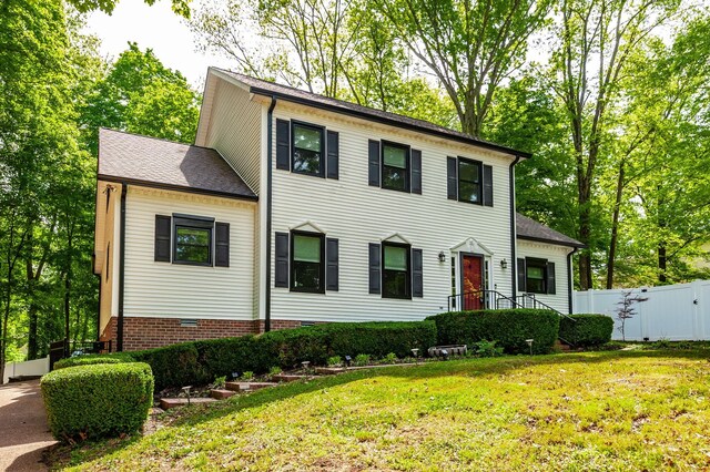 1505 Newmans Trl, Hendersonville, TN 37075 - colonial house with fence, roof with shingles, and a front lawn
