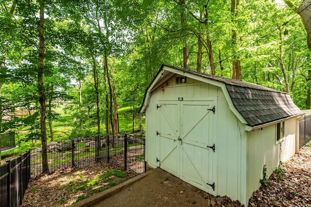 1505 Newmans Trl, Hendersonville, TN 37075 - view of shed with fence and a trampoline