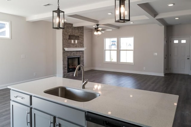 405 Galway Dr, Clarksville, TN 37042 - kitchen featuring open floor plan, dark wood-style floors, plenty of natural light, beam ceiling, and coffered ceiling