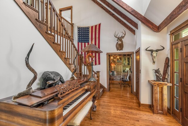 5959 River Trce, Nashville, TN 37218 - interior space featuring stairs, high vaulted ceiling, baseboards, and wood finished floors