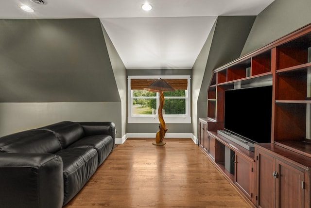 5959 River Trce, Nashville, TN 37218 - living area featuring baseboards, recessed lighting, vaulted ceiling, and light wood-type flooring
