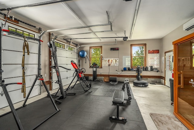 5959 River Trce, Nashville, TN 37218 - workout area featuring a garage and an AC wall unit