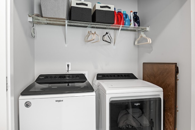 washroom featuring washer and dryer